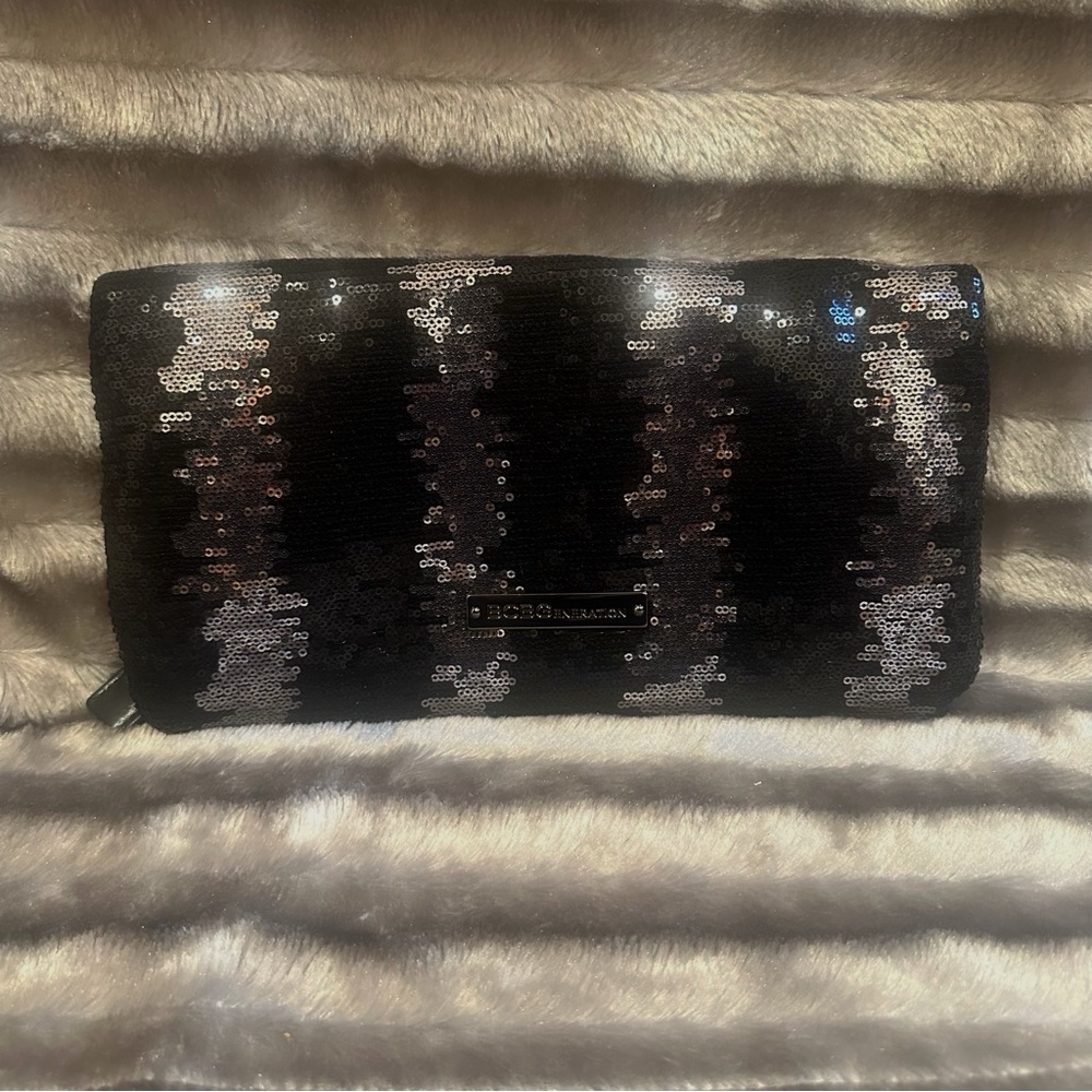 BCBGENERATION fold over sequins clutch